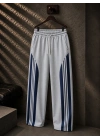 ÜÇ ÇİZGİLİ BAGGY ADD EŞOFMAN
