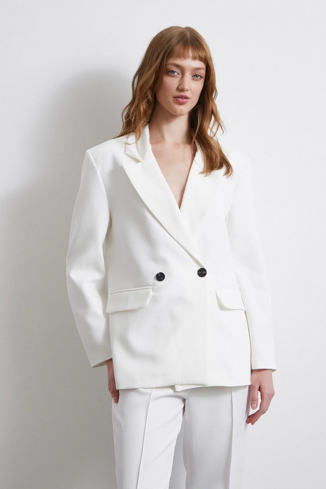 سترة بوليفيسكون كلاسيكية باللون العاجي