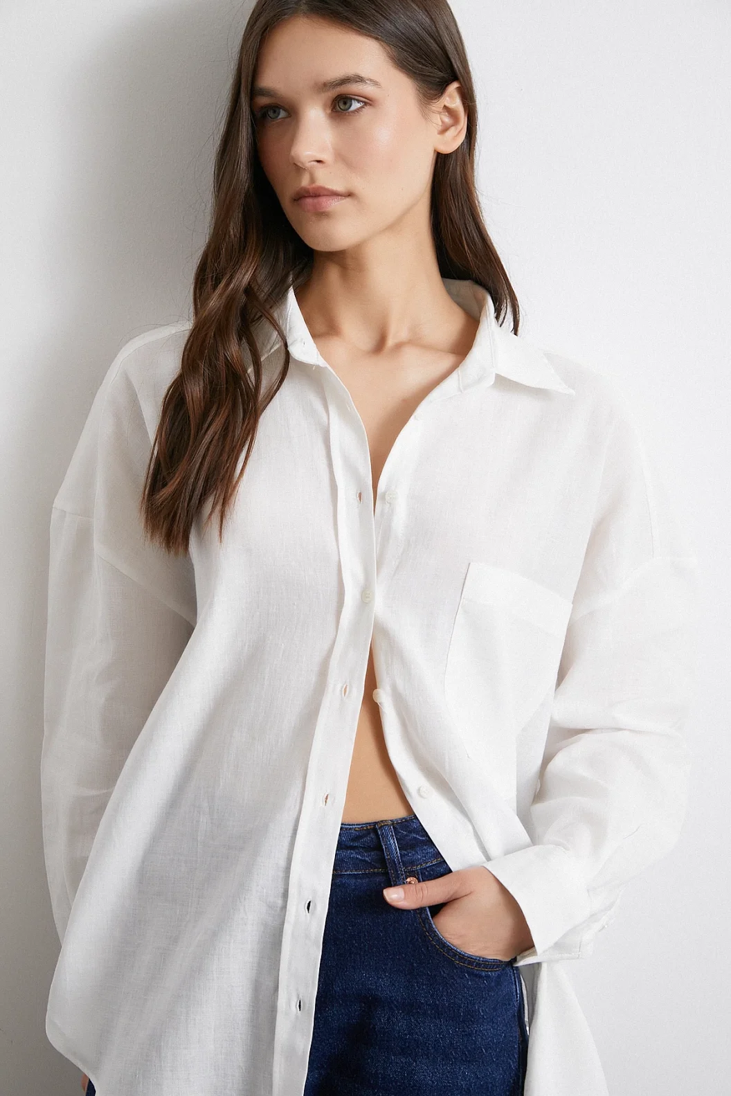 قميص كتان فضفاض بجيب كبير