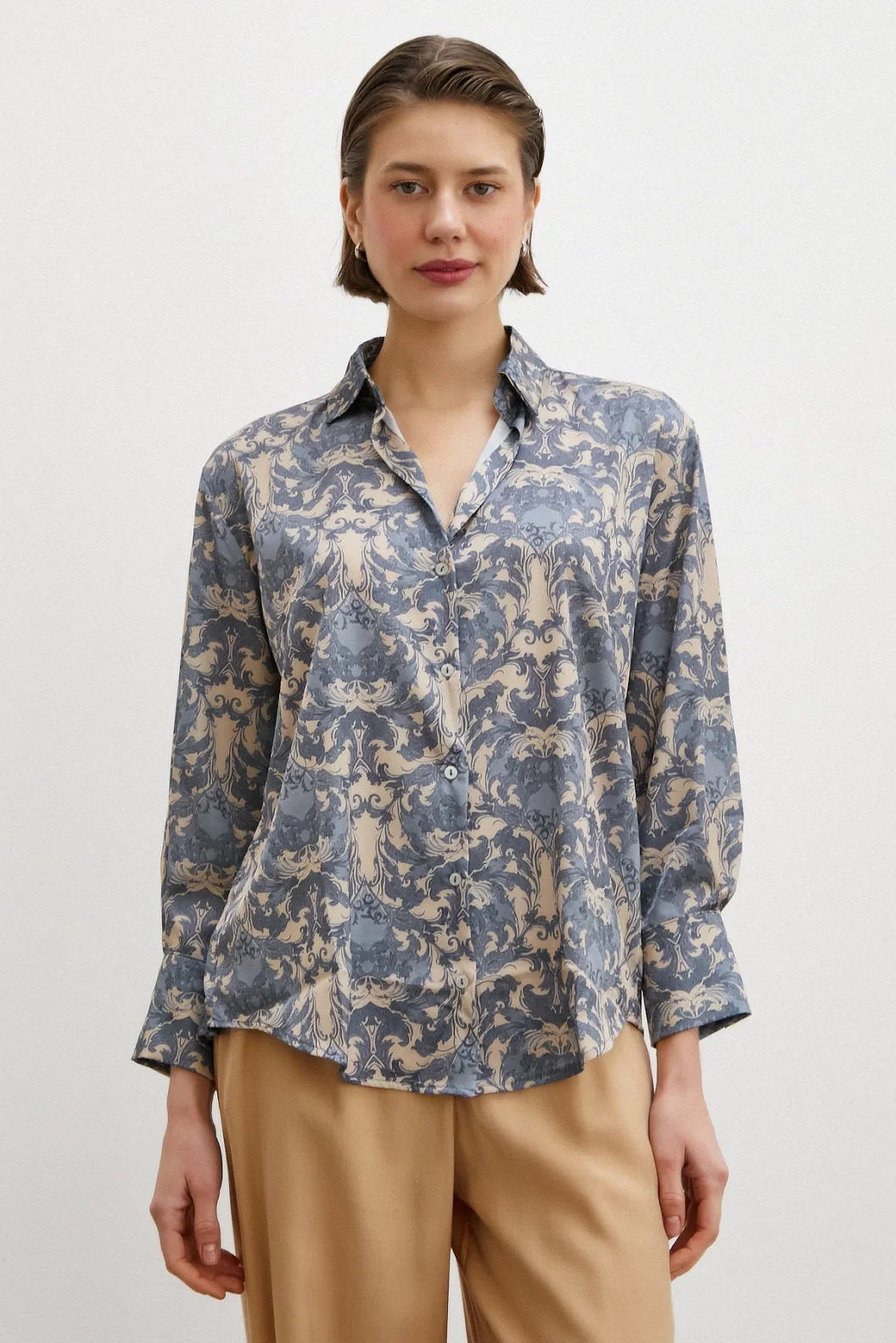 Gestrickte V-Ausschnitt-Bluse mit Schalldesign Türkis