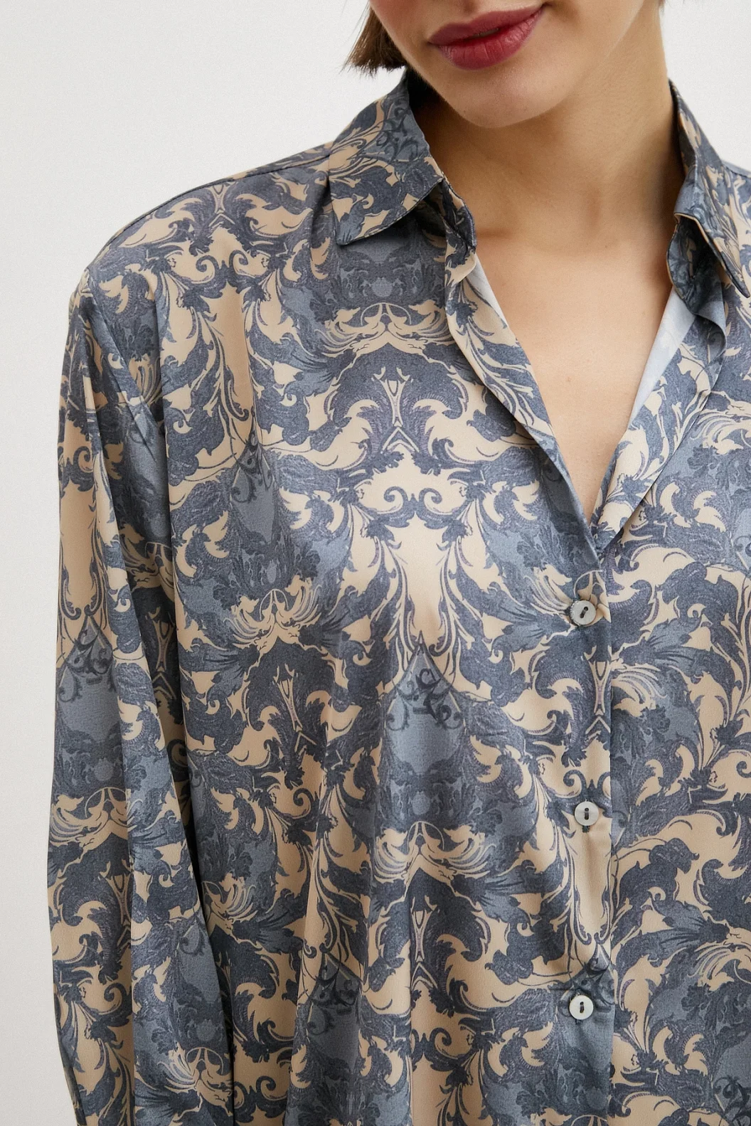 Gestrickte V-Ausschnitt-Bluse mit Schalldesign Türkis