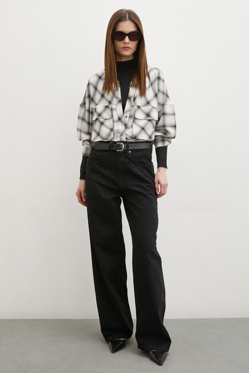 قميص مربعات مُصمّم بجيوب متفاوتة