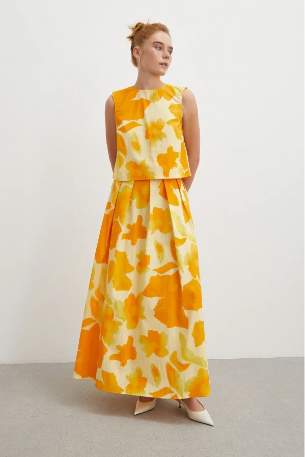 نمط باتيك بلوزة بلا أكمام باللون الأصفر