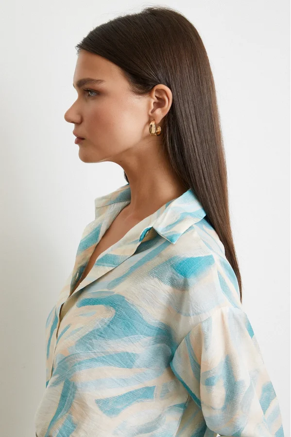 نسيم البحر قميص تركواز