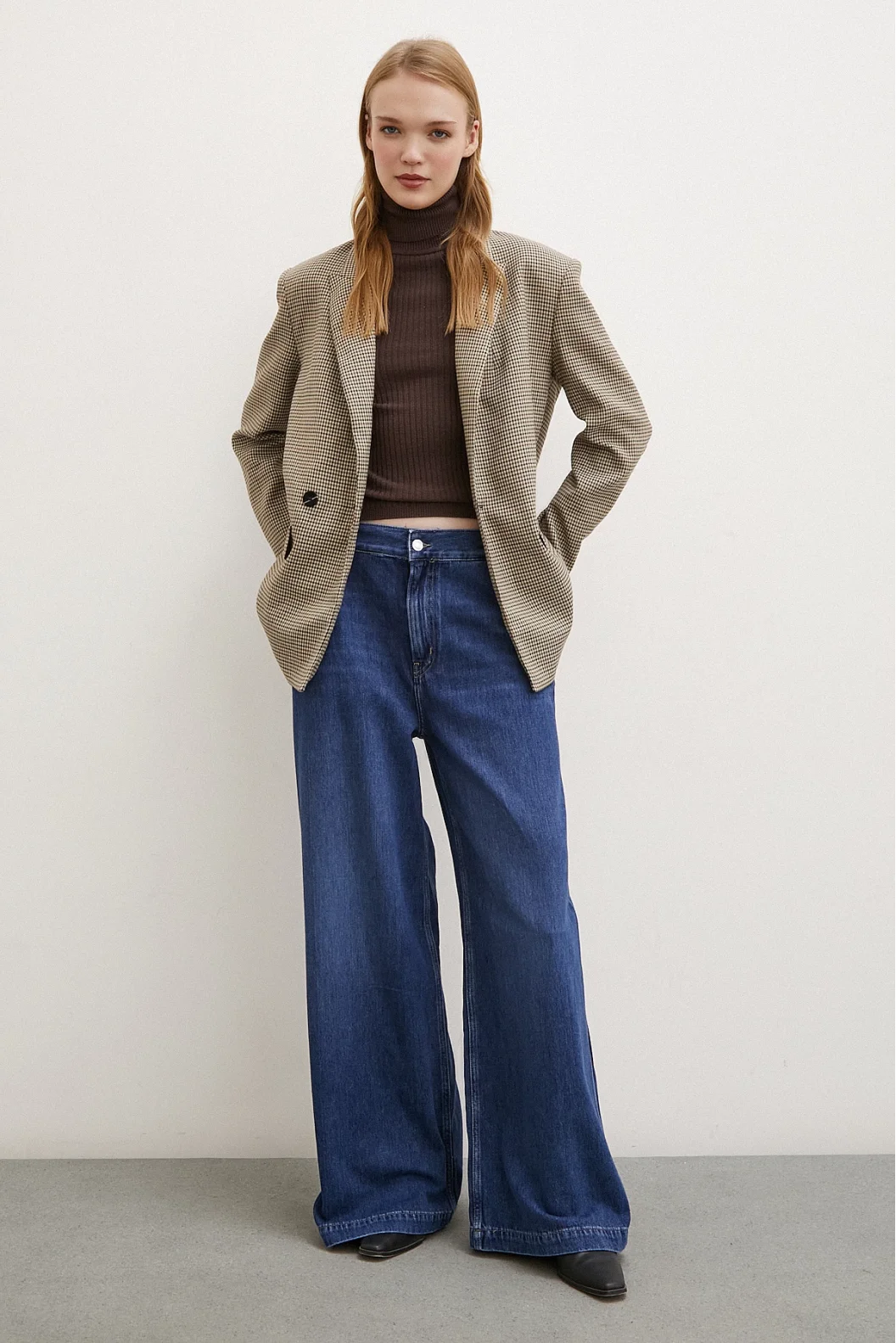 Hoch geschnittene weite Beinschlag-Jeans Blau