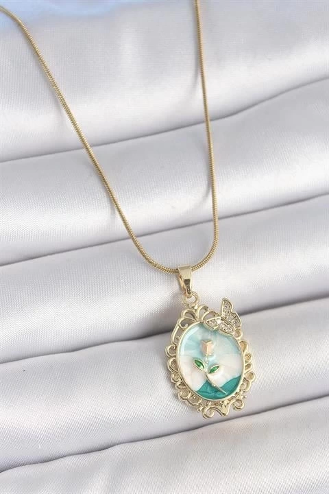 316L Çelik Gold Renk Zincir Mavi Mineli Çiçek İşlemeli Zirkon Taş Detaylı Portre Model Kadın Kolye