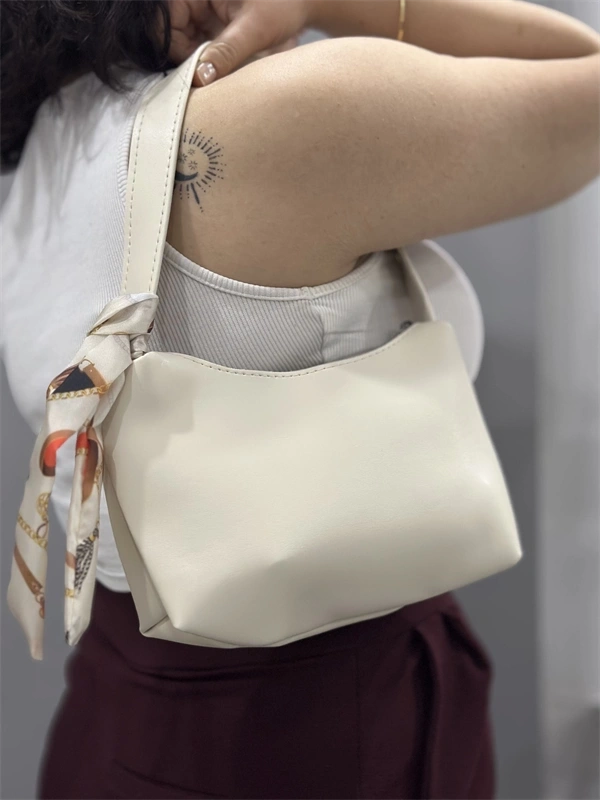 Riwan krem cilt çanta