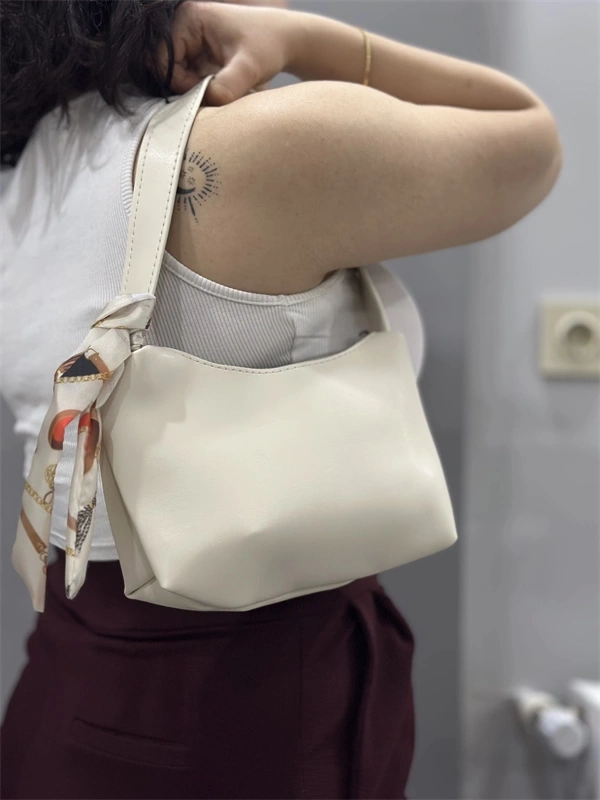 Riwan krem cilt çanta