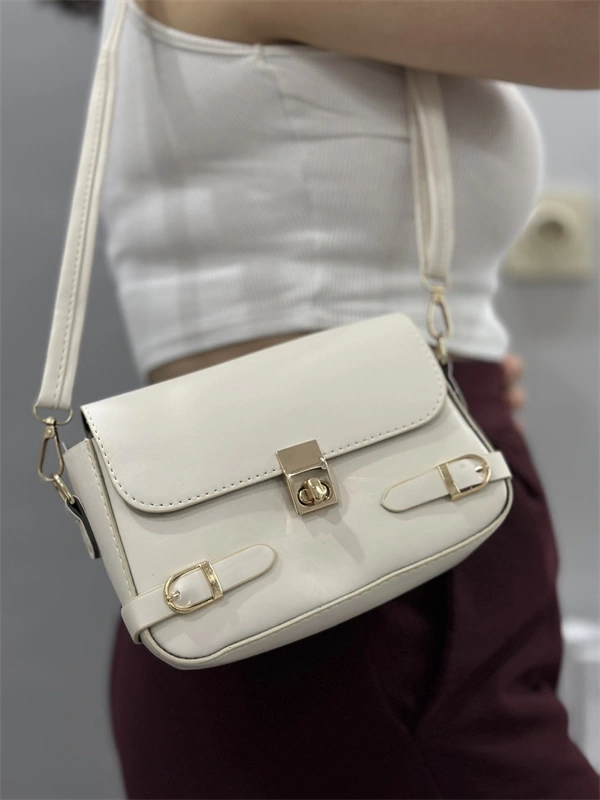 Zerej kemerli krem cilt çanta