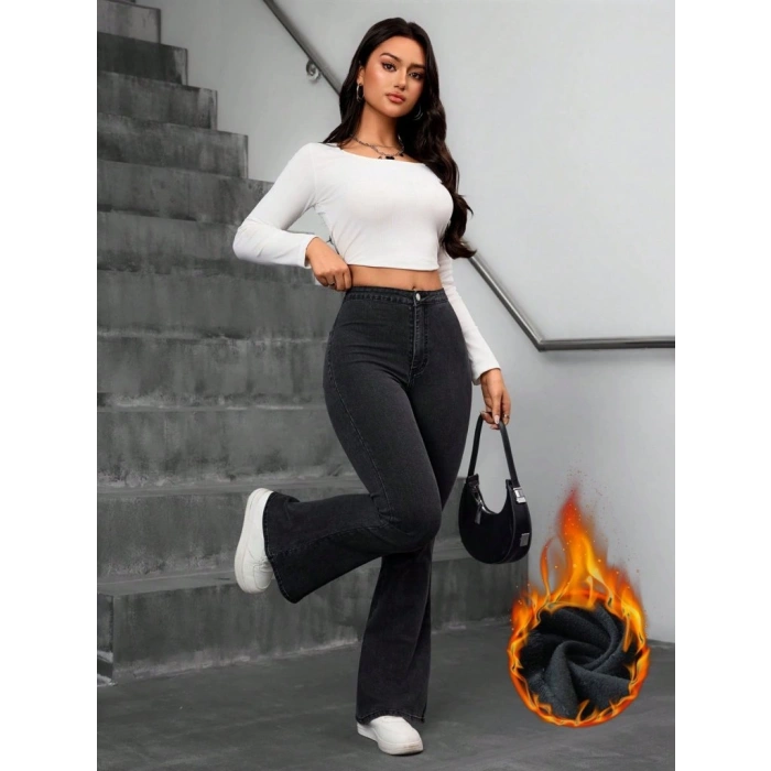 Kadın Yüksek Bel Tek Düğmeli Paçaya Doğru Genişleyen Kot Pantolon