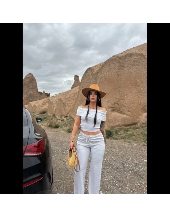 Madonna yaka bol paça pantolonlu takım