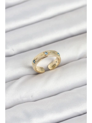 Pirinç Gold Renk Mavi Zirkon Taşlı Kutup Yıldızı Model Kadın Yüzük