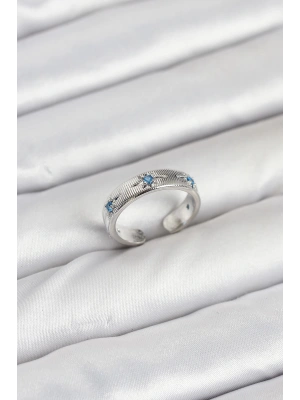 Pirinç Gümüş Renk Mavi Zirkon Taşlı Kutup Yıldızı Model Kadın Yüzük