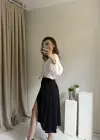 Siyah İçi Şortlu Asimetrik Kesim Etek