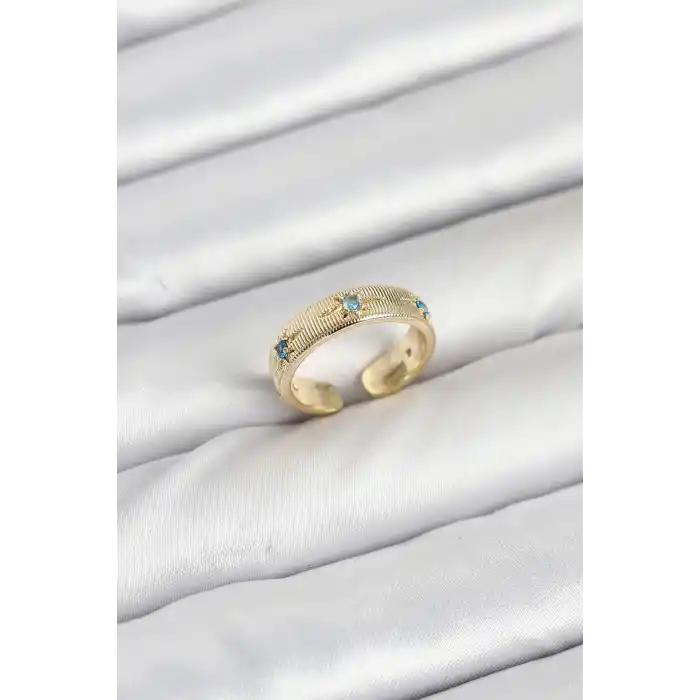 Pirinç Gold Renk Mavi Zirkon Taşlı Kutup Yıldızı Model Kadın Yüzük