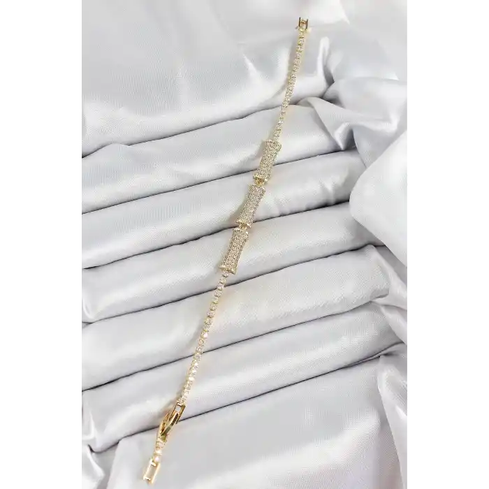Pirinç Gold Renk Zirkon Taşlı Kemik Model Kadın Bileklik