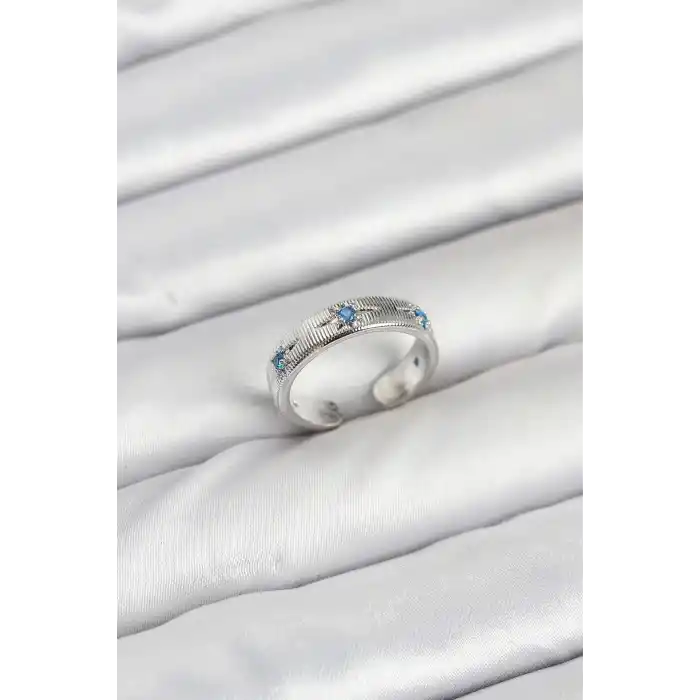 Pirinç Gümüş Renk Mavi Zirkon Taşlı Kutup Yıldızı Model Kadın Yüzük