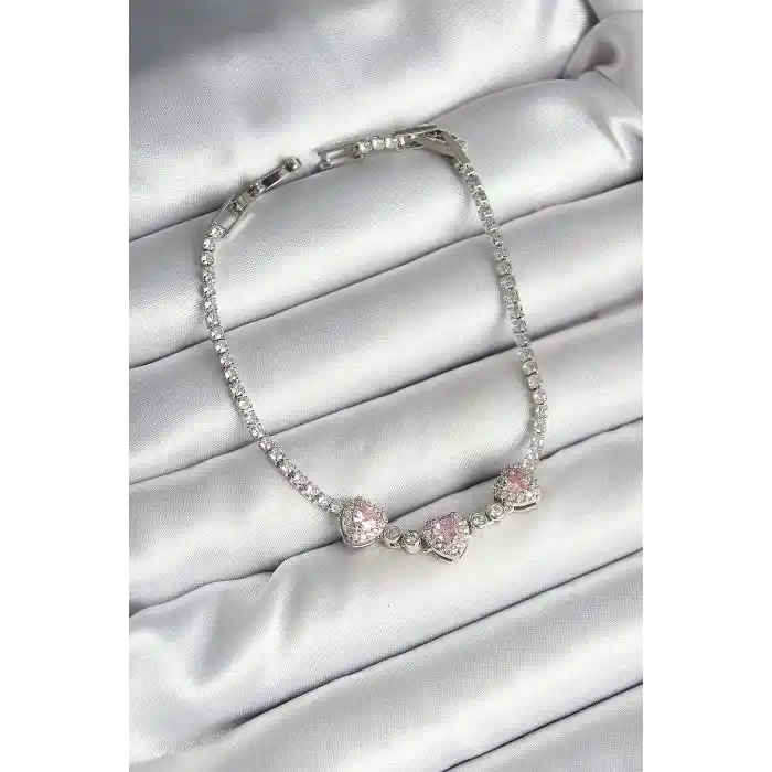 Pirinç Sıralı Pembe Kalp Figürlü Zirkon Taşlı Gümüş Renk Kadın Bileklik