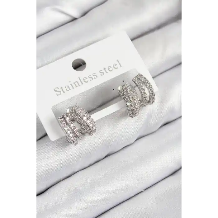 Pirinç Zirkon Taşlı Kıvrımlı Model Gümüş Renk Kadın Küpe