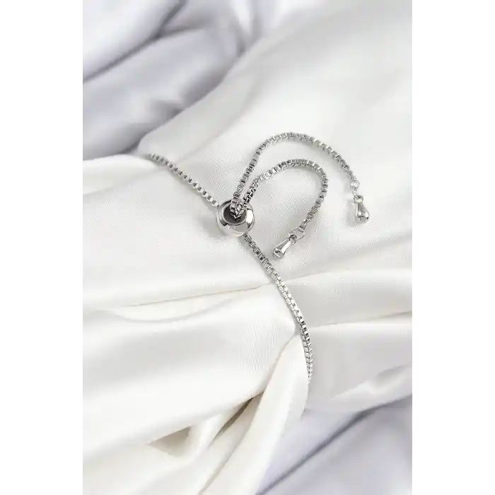 Pirinç Zirkon Taşlı X Detaylı Su Yolu Model Gümüş Renk Asansörlü Kadın Bileklik