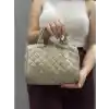 Kapaksız kapitone bej cilt çanta