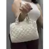 Kapaksız kapitone krem cilt çanta