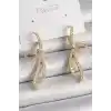 Pirinç Gold Renk Zirkon Taşlı Kurdele Model Kadın Küpe