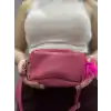 Ponpon fuşya cilt çanta