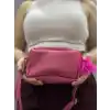 Ponpon fuşya cilt çanta