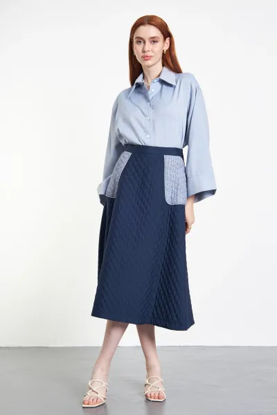 CEP DETAYLI LACİVERT KAPİTONE ETEK