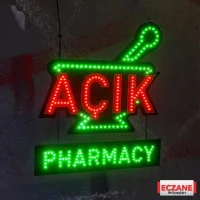 Havan Figürlü Pharmacy Açık Tabelası