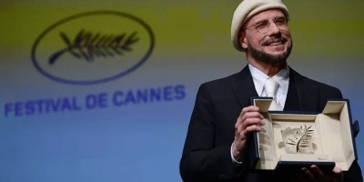 JOHN TRAVOLTAYA SÜRPRİZ ÖDÜL: ÜNLÜ OYUNCU CANNESDA GÖZYAŞLARINI TUTAMADI