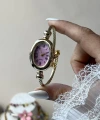 Pembe Oval Ekran Kelepçe Saat