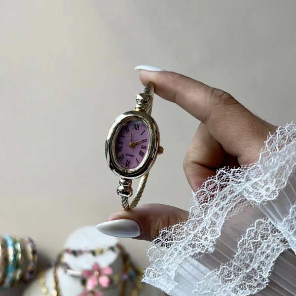 Pembe Oval Ekran Kelepçe Saat