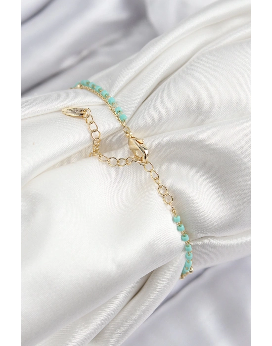 MuI MuI Pirinç Zirkon Taşlı Mavi Boncuklu Model Gold Renk Kadın Bileklik