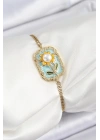 MuI MuI 316L Çelik Zincir Turkuaz Mineli Sanatsal Portre İnci Detaylı Papatya Model Gold Renk Kadın Bileklik