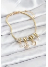 MuI MuI Pirinç Gold Renk Kutup Yıldızı ve Kalp Charmlı Kadın Bileklik