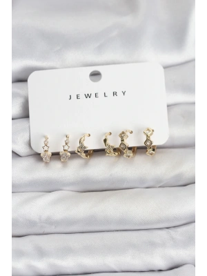 MuI MuI Gold Renk Pirinç Yıldız Modelli Kadın Küpe Seti