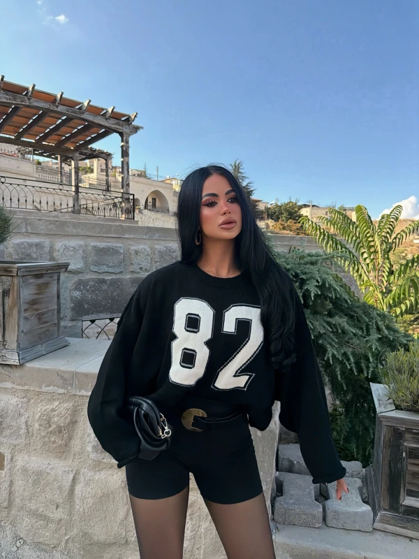 Siyah 82 Kolları Volanlı Triko