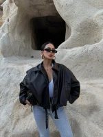 Siyah Kemerli Yarasa Kol Deri Mont