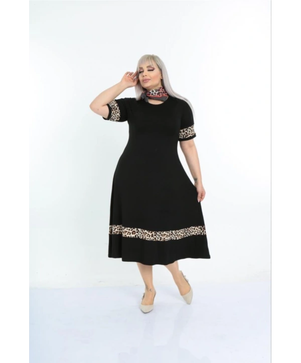 Kadın Siyah Kol ve Etek Ucu Leopar Desenli Büyük Beden Elbise