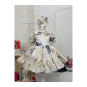 Krem Bebe Yakalı Kız Çocuk Elbisesi