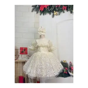 Krem Ön Fırfırlı Kız Çocuk Elbisesi