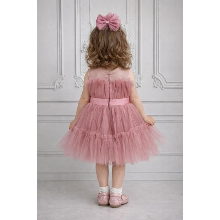 Kız Çocuk Gül Kurusu Şeffaf Üst Ön Fiyonk Detaylı Kemerli Kabarık Elbise