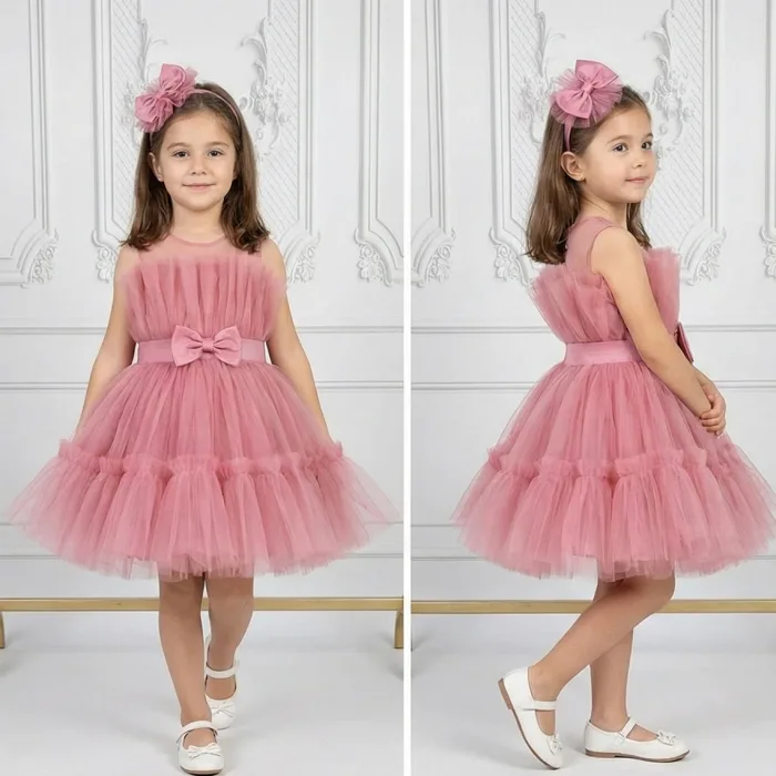 Kız Çocuk Gül Kurusu Şeffaf Üst Ön Fiyonk Detaylı Kemerli Kabarık Elbise