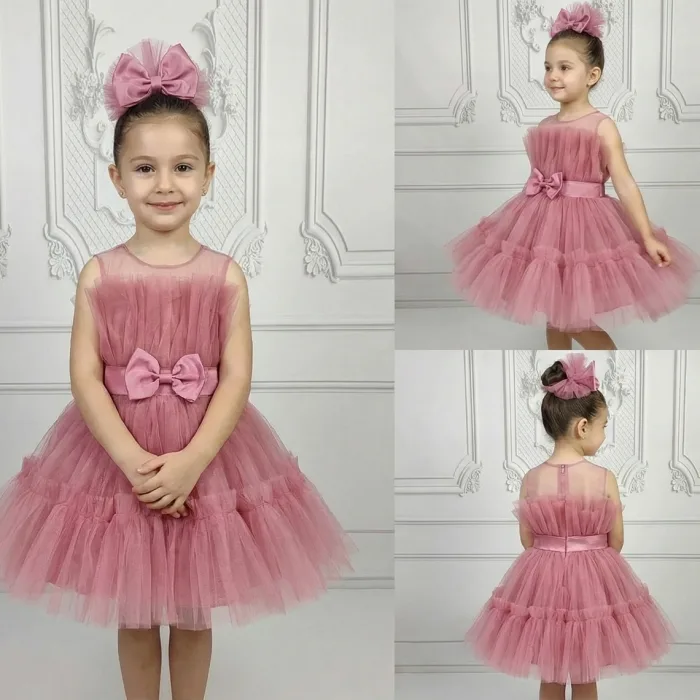 Kız Çocuk Gül Kurusu Şeffaf Üst Ön Fiyonk Detaylı Kemerli Kabarık Elbise