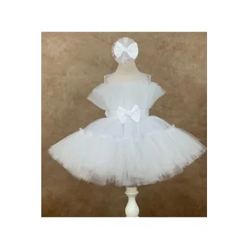 Kız Çocuk Beyaz Şeffaf Üst Ön Fiyonk Detaylı Kemerli Kabarık Elbise