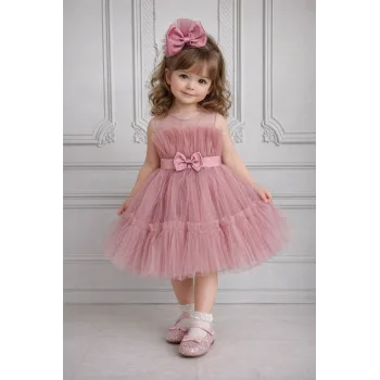 Kız Çocuk Gül Kurusu Şeffaf Üst Ön Fiyonk Detaylı Kemerli Kabarık Elbise