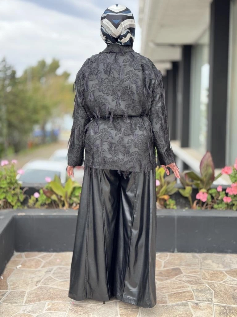 Vuu Dikiş Detaylı Geniş Paça Deri Pantolon