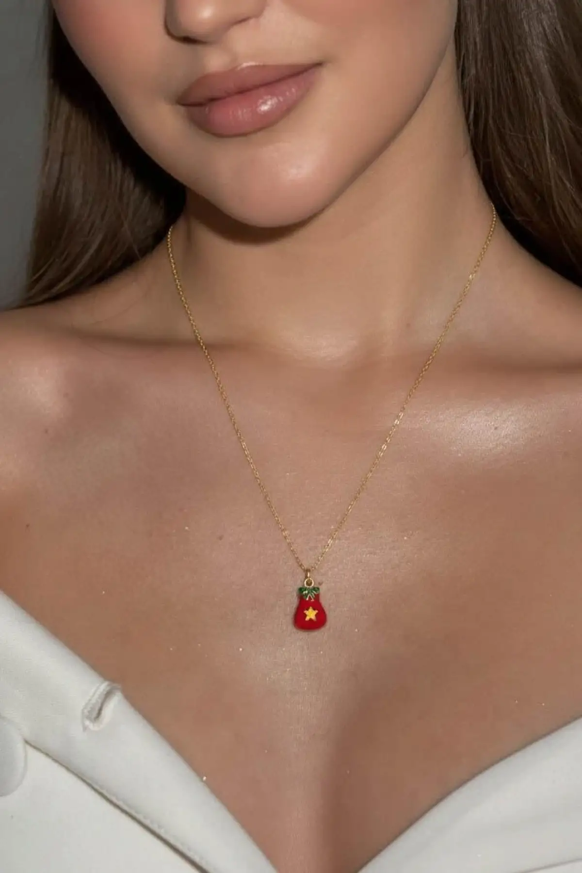 Altın Renk Eldiven Figürlü Çelik Yılbaşı Kolyesi